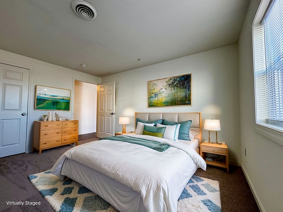 Virtually Staged First Bedroom in a 2 bed, 1 Bath Unit