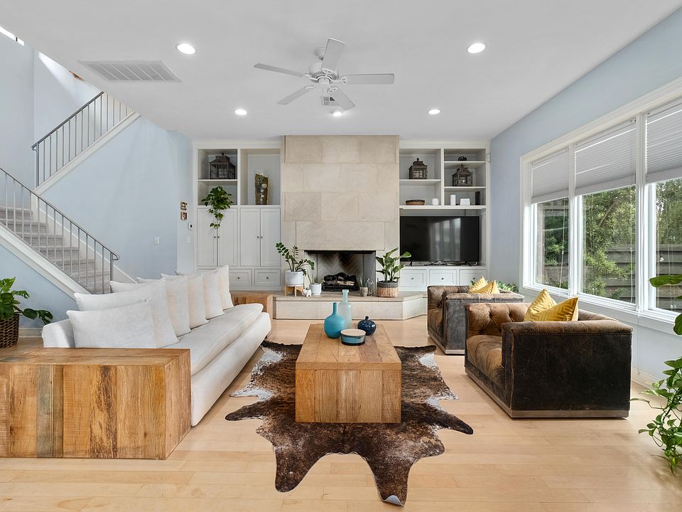 Spacious Living Room w/ Electric Fireplace & City View