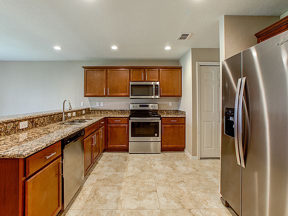 Gourmet kitchen with granite, 18-in. ceramic tile,