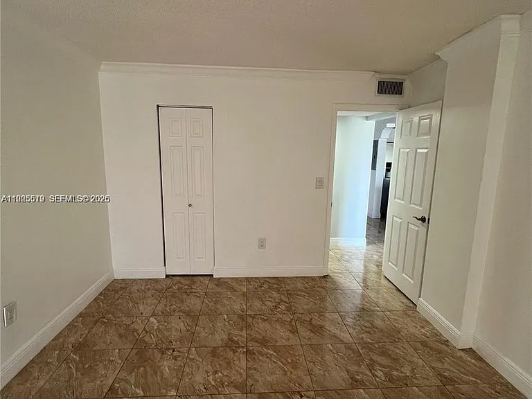 1075 W 68th St #218 — Photo 8