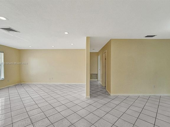 4th image of 561 NW 45th Ter
