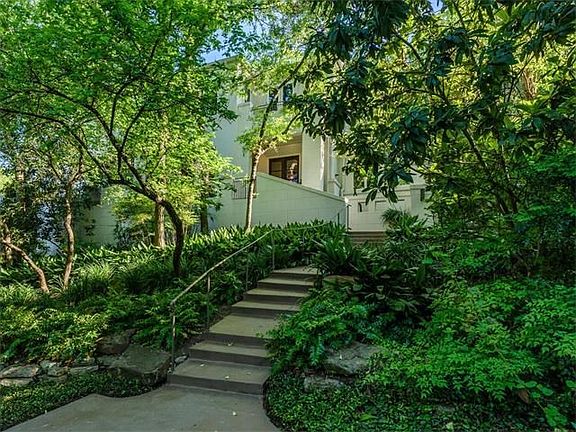 You will only hear birds chirping as you enter this private contemporary retreat.  Such a peaceful setting!