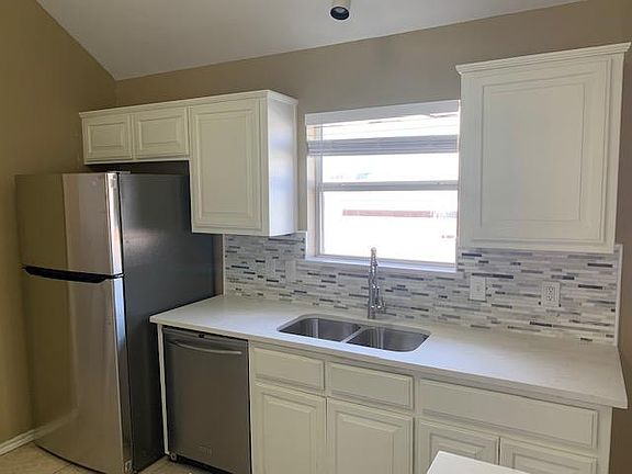 Stainless steel appliances - Nice window above sink.