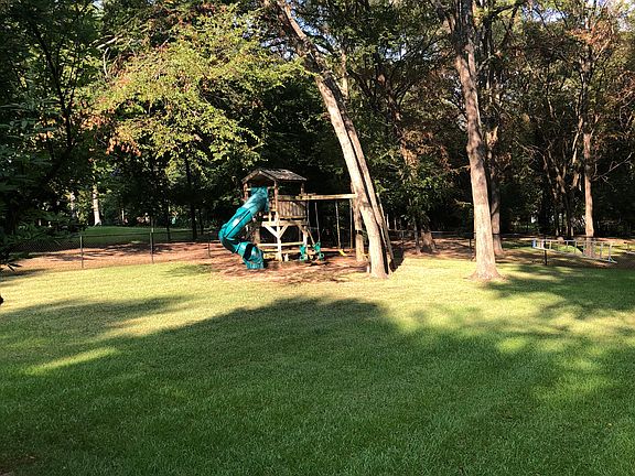 Park-like fenced backyard