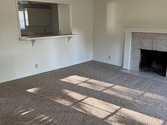 Living room looking into kitchen.