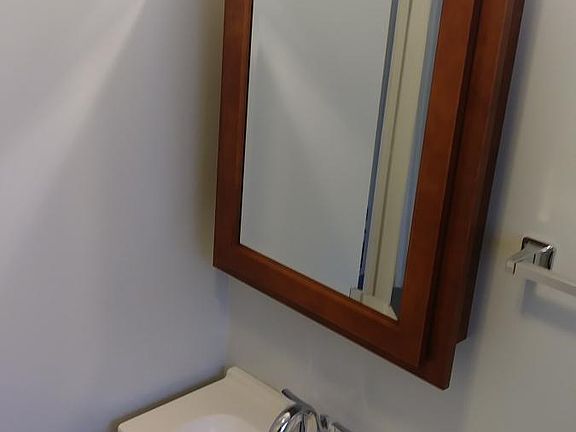 bathroom vanity and mirror