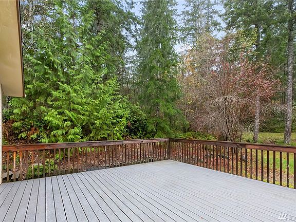 Another view of the expansive deck and yard.