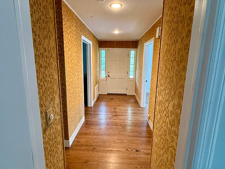Hallway outside of bedrooms and bathroom