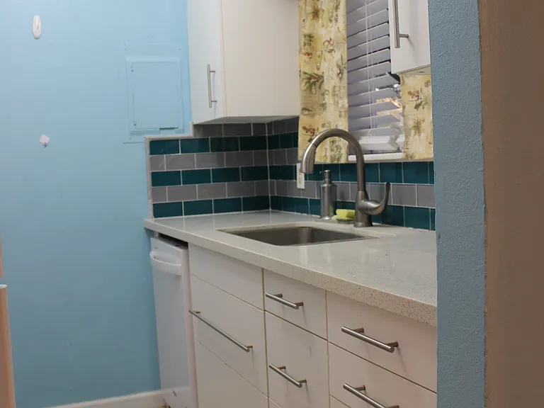 Pull out drawer under the sink for easy access.