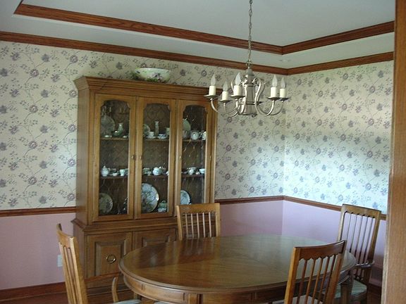 Formal dining room with tray ceiling