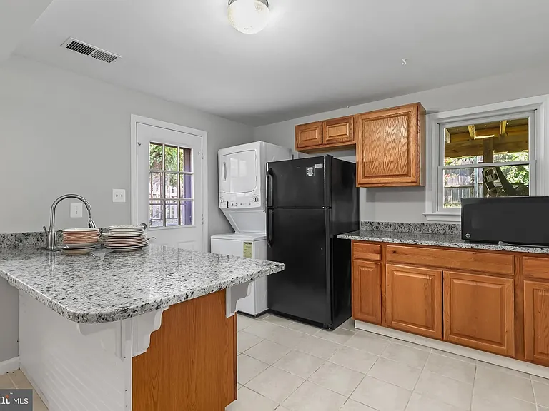 8421 Hollis Ln — Photo 32