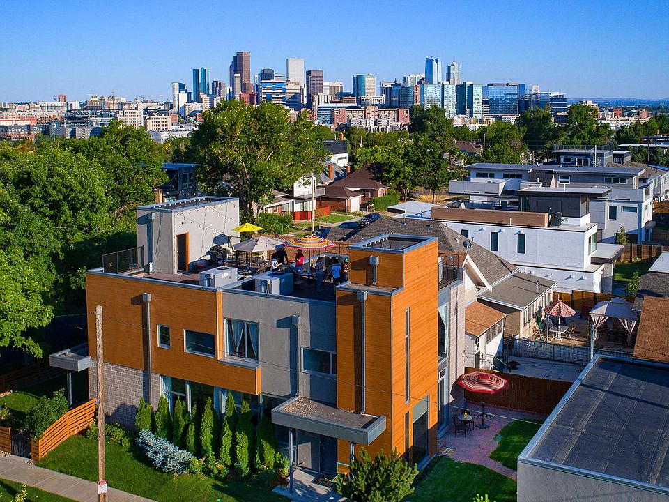 Enjoy modern living in this half-duplex property in Denver's Lower Highlands (Lo-Hi). Marvel at the roof deck with a hot tub and stunning views.