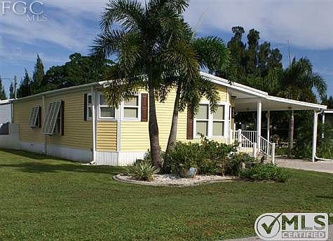 Bahama shutters on the West side and some fruit trees (not pictured).