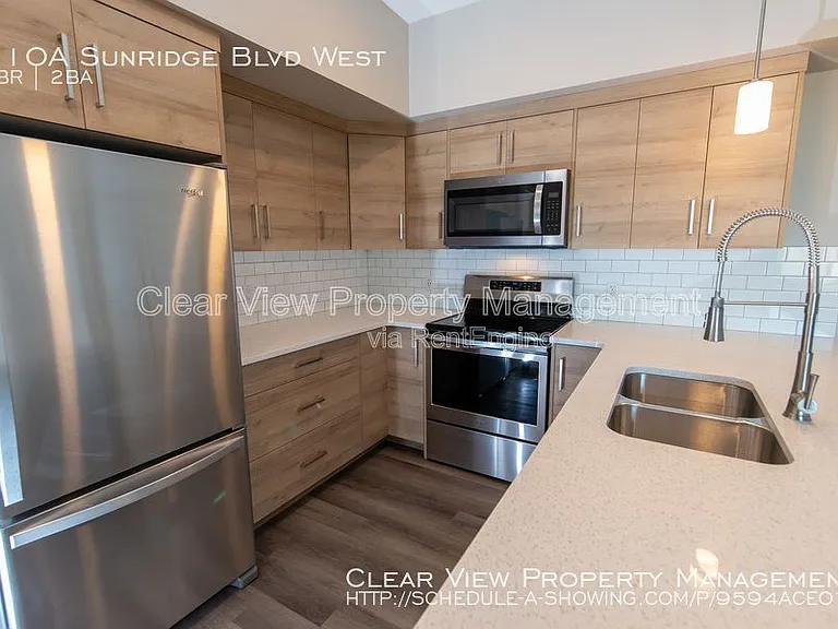 118 Sunridge Blvd W #UPPER LEVEL — Photo 5