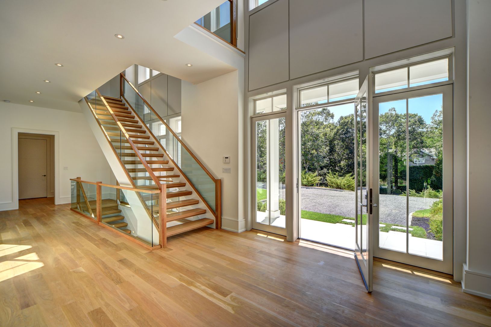  Foyer with Architectural Free Floating Stairs