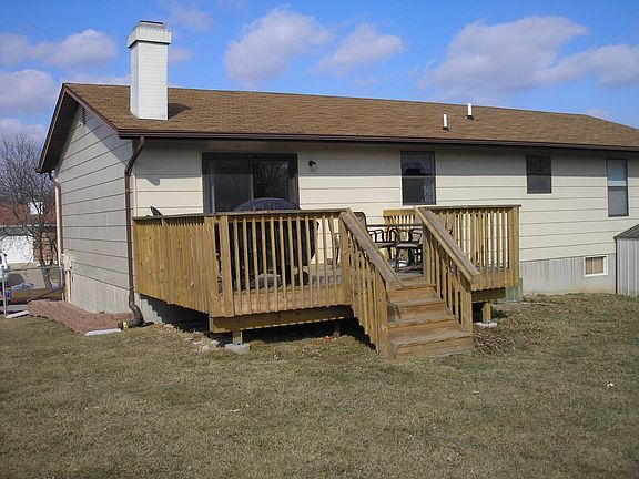 Rear deck and level, fenced yard