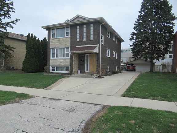 5th image of 9405 S Kolmar Ave