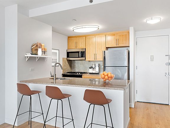 3rd image of 245 E 124th St APT 12P