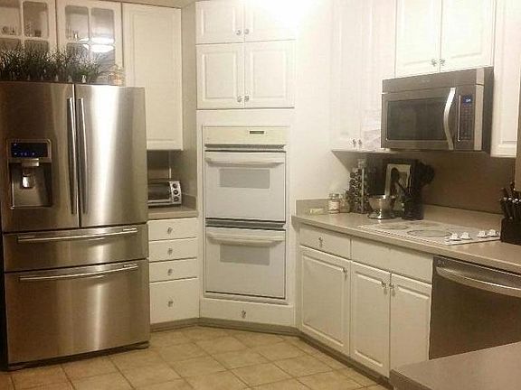Great kitchen space. New stainless ovens (not shown in photo