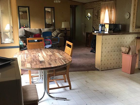 Living Room/Kitchen area. MH inside being updated.