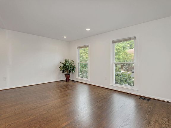 LIVING ROOM WITH WARM WOOD FLOOR