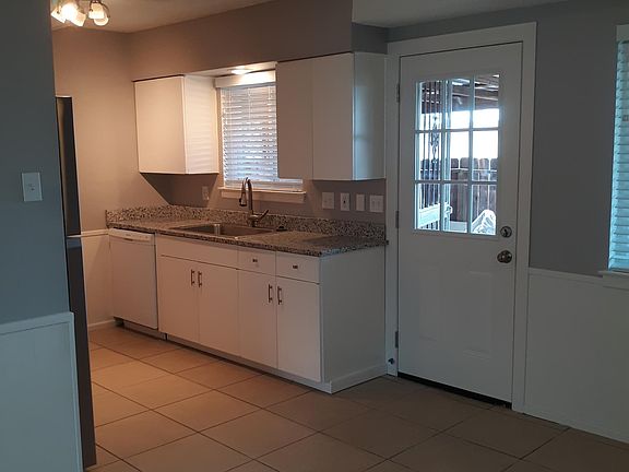 looking from dining room to kitchen