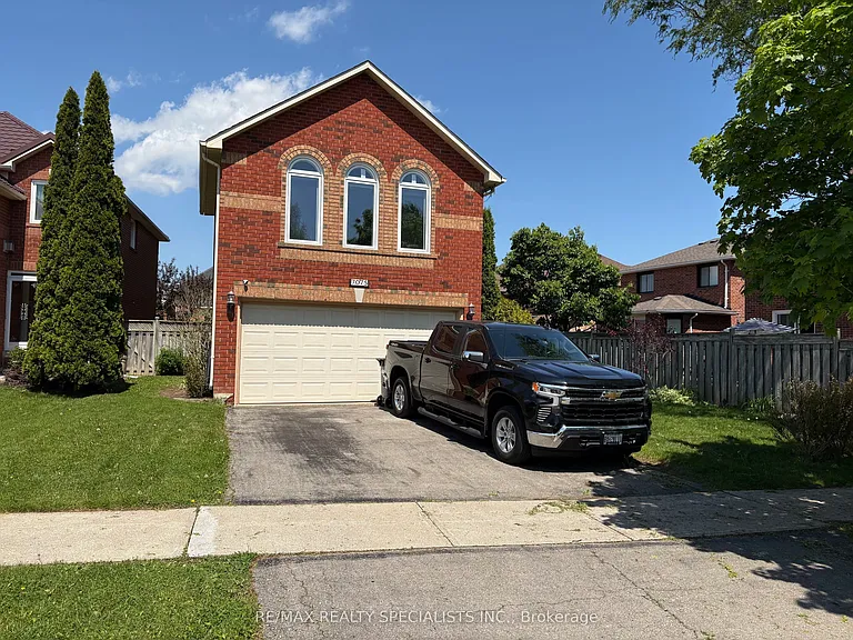 7075 Spyglass Cres — Photo 1
