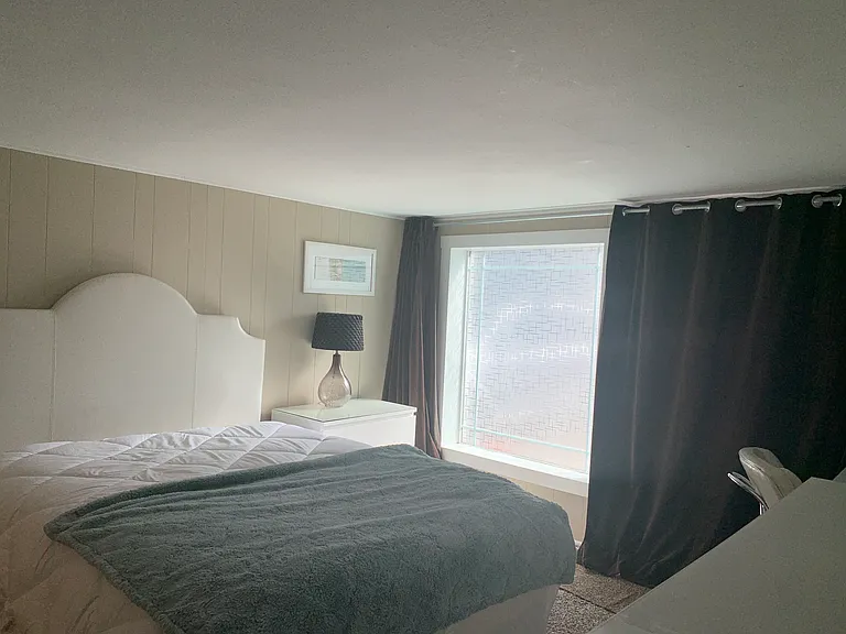 Bottom suite with black-out curtains, separate entrance, private bath.