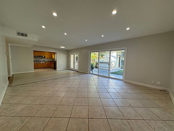 spacious open-concept living and dining area