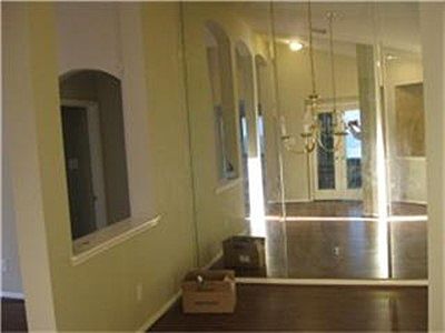 Formal Dining with a wall of mirror