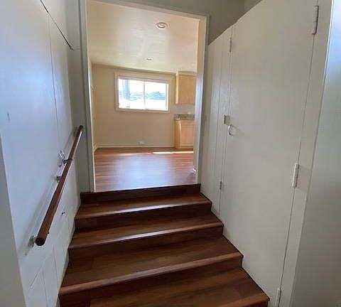 Short flight of stairs to kitchen