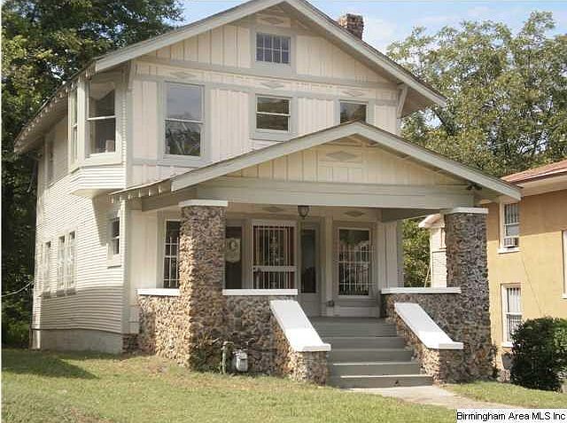 Beautiful large front porch with swing