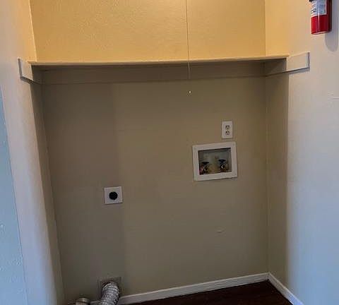 Washer dryer connection located across from kitchen