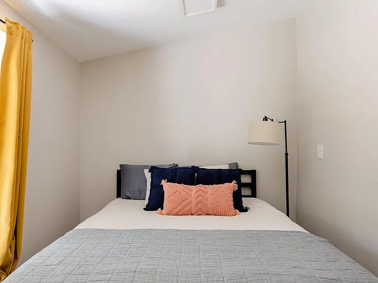 Cozy room with a queen bed. It is a bit detached from the rest of the house as it is through the "utility hallway".