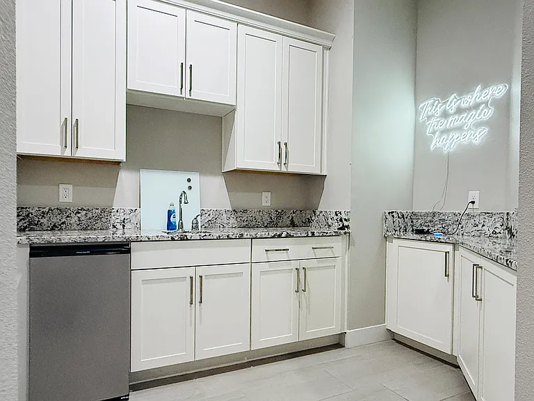 Your full kitchenette has a fridge, sink, cooktop, microwave, and plenty of cabinet space.
Plates, Utensils, Knives, Cups & more available to you.