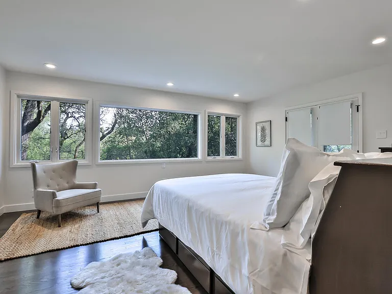 guest suite with access to main deck and private patio
