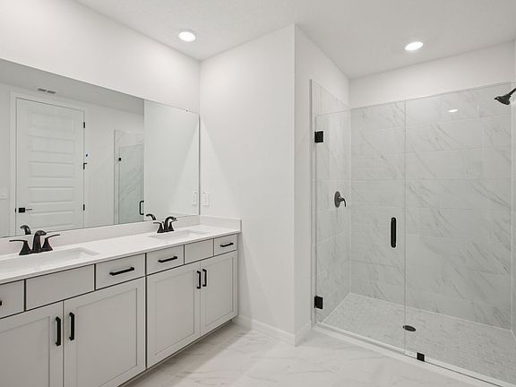 The Jasmine Floorplan Primary Bathroom Represented at Two Rivers