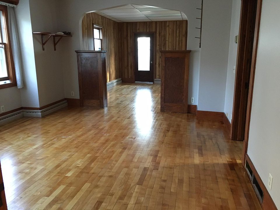 Dining room/living room. Built ins and hardwood floors.