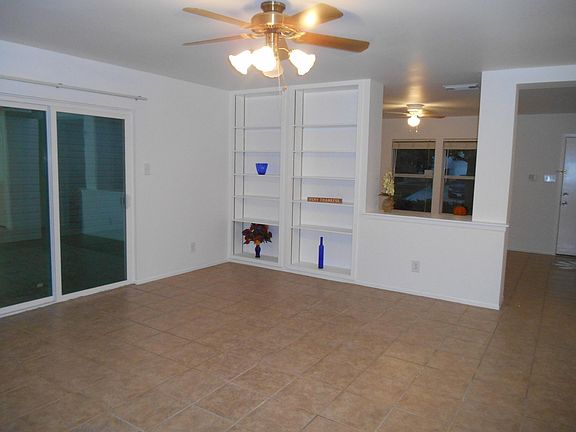 FAMILY ROOM WITH BUILT-IN SHELVES