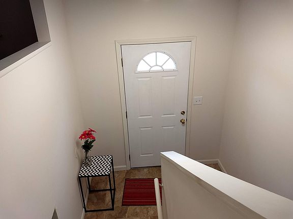 Front entry viewed from the top of the stairs