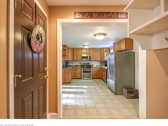 Entry from garage to Mudroom.  Off Kitchen.