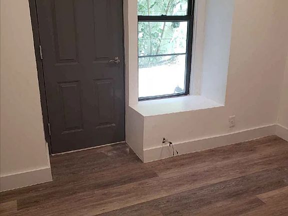 2nd image of 58 E 1st St APT 1A