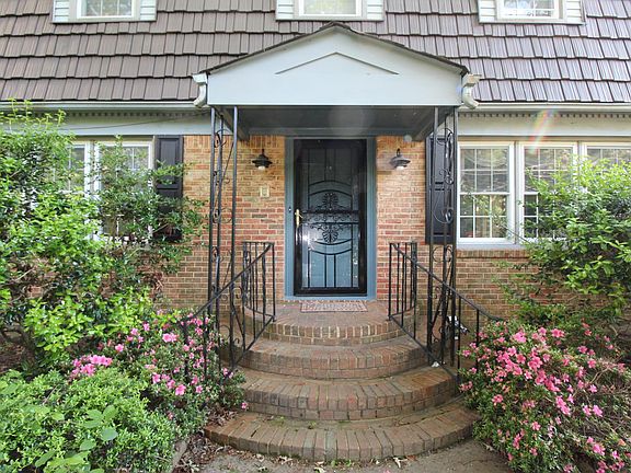 front entrance with storm door