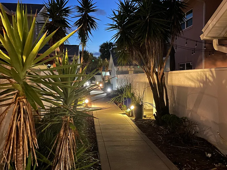 Shared walkway with gated access to your private back patio.