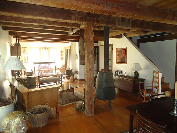 living/dining room with Jotul wood stove