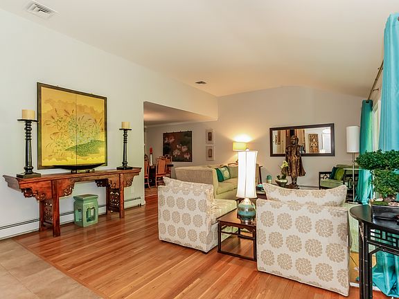 Another view of living room open to dining room