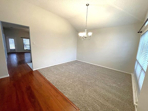 Flex space leads to open floorplan.