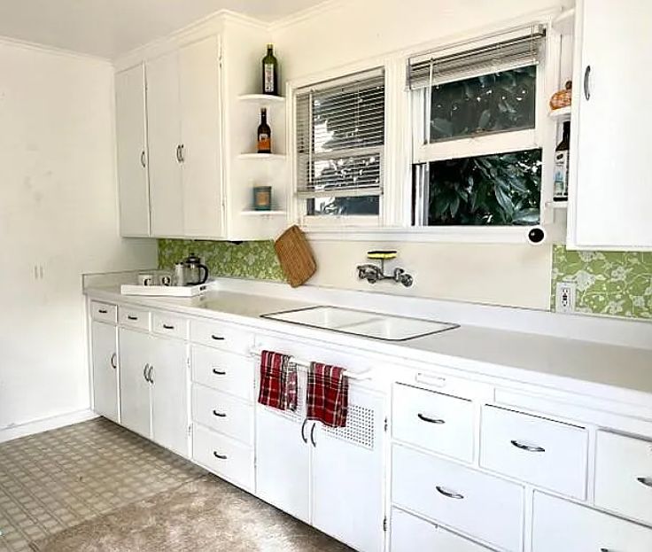 Kitchen, which you walk into first from the front door.