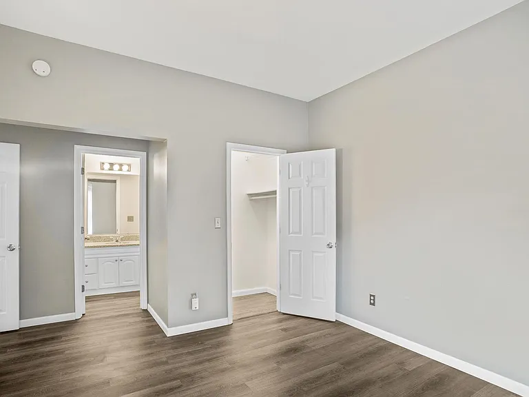 1 of 2 bedrooms with closet and 1 of 2 bathrooms