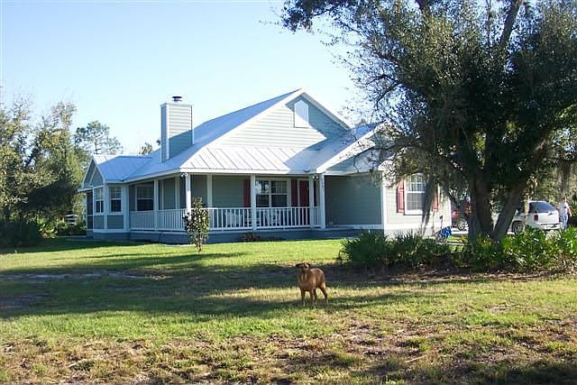 newer home on 5.62 acres!